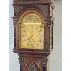 A late Victorian 8-day chiming longcase clock, the arched gilt dial with painted moonphase, silve...