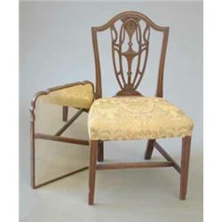 A George III mahogany single chair, the channelled frame with domed back rail and pierced vase sp...