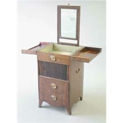 A George III mahogany rectangular washstand, with divided hinged top, the front with tambour fron...