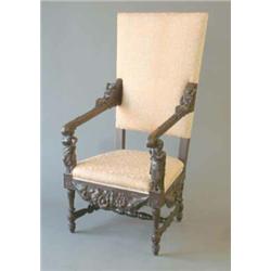 A 19th century Continental carved oak throne chair with figural arms and floral apron...