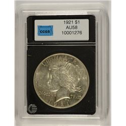 1921 PEACE SILVER DOLLAR, CCGS AU-58