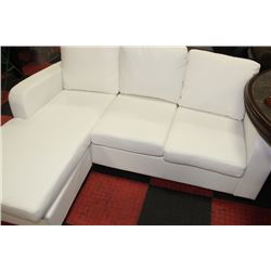 WHITE LEATHERETTE APT SIZE SECTIONAL