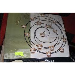 NEW SWIRL TEALIGHT HOLDER