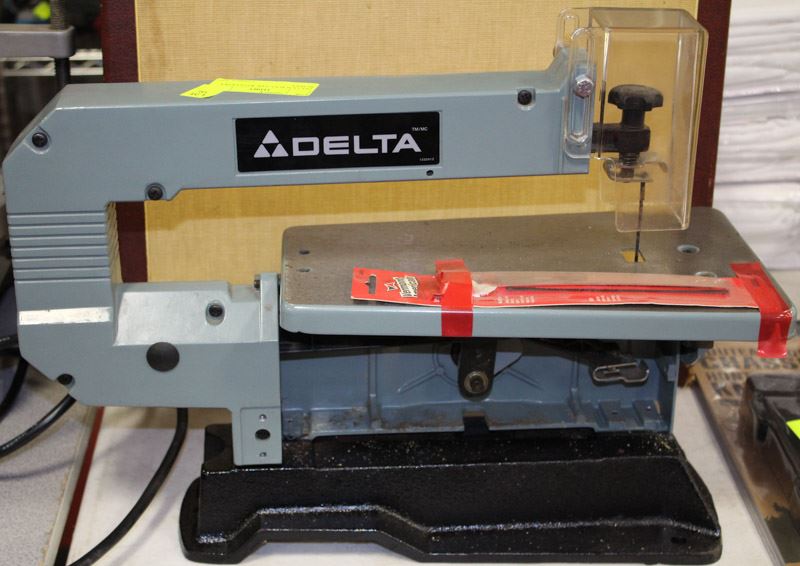 DELTA SCROLL SAW WITH EXTRA BLADES