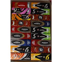 FLAT OF NEW IN BOX GOLF BALLS