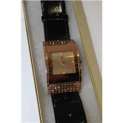 CK BLACK & COPPER WRIST WATCH