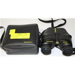 BUSHNELL BINOCULARS IN CASE  7-15x25 ZOOM
