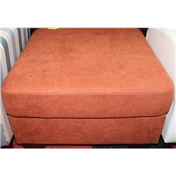 RUST COLOURED FABRIC OTTOMAN