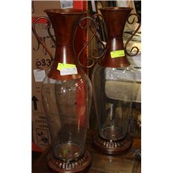 PAIR OF TRANSPARENT & COPPER TONE DECORATIVE VASES