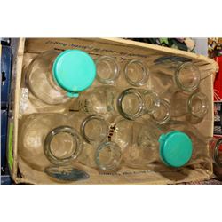 SMALL BOX OF LABELED MILK JARS