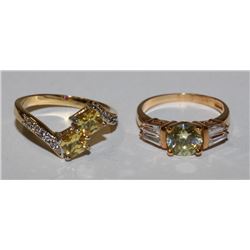 2 GOLD TONE FASHION RINGS IN BAG