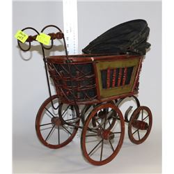 WOOD AND METAL CARRAGE ORNAMENT