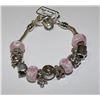 Image 1 : SILVER CHARM BRACELET WITH PINK STONES