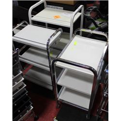 3 WHITE TABLES ON CASTORS