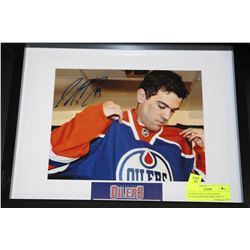 JUSTIN SCHULTZ FRAMED & AUTOGRAPHED ROOKIE PHOTO