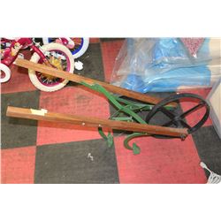 VINTAGE CULTIVATOR TURNED GARDEN ART