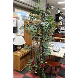 ARTIFICIAL TREE WITH FLOWERS AT BASE