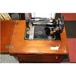 SINGER SEWING MACHINE ON STAND