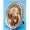 Image 1 : A George V oval silver photograph frame, Birmingham 1919, 7 ins....