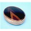 Image 1 : A 19th century Continental oval gilt metal and agate snuff box...
