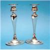 Image 1 : A pair of silver candlesticks, with tapered hexagonal stems and oval bases, 9.5 ins....