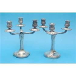 A pair of French plated 3-light candelabra, with fluted stems and tri-lobed bases, 9 ins....
