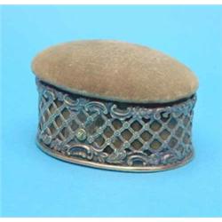 A late Victorian silver pin cushion casket, with lattice work sides, 4 ins....