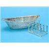 Image 1 : An Edwardian pierced silver bowl, of elliptical form, 8 ins, and a small toastrack....