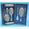 Image 1 : An Edwardian 7-piece silver dressing table set decorated with irises, in fitted case with associa...