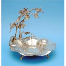 A Mappin and Webb plated fruit basket with vineous flying scroll handle....