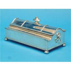 A plated treasury type inkstand, with domed lid and two glass wells....