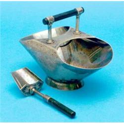 A Hukin and Heath plated sugar basket and scoop, with aesthetic engraving and wooden bar handle....