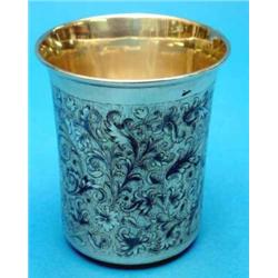 A Russian 84 zolotnik tumbler, with niello scrolling foliate decoration, 1851....