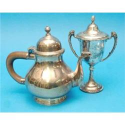 A George V Britannia standard silver tea pot, of baluster form with wooden handle, 1912, (Gross 1...