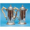 Image 1 : A pair of George VI silver cafe au lait pots, of George III design with ivory scroll handles, Mak...