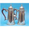 Image 1 : A pair of Georgian design silver cafe au lait pots, with wooden scroll handles, Birmingham 1962,...