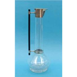 A Victorian silver mounted glass claret jug, of stylish design with ebonised bar handle, Makers H...