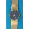 Image 1 : A ladys 18ct gold Choppard wrist watch, with black dial and flexible bracelet....