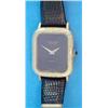Image 1 : A ladys 18ct gold Favre-Leuba wrist watch with textured case, black dial and quartz movement....
