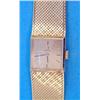 Image 1 : A ladys 18ct gold Omega wrist watch with integral flexible bracelet and square dial....