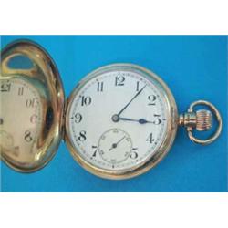 A George V 9ct gold keyless hunter with enamelled Arabic dial with subsidiary seconds....
