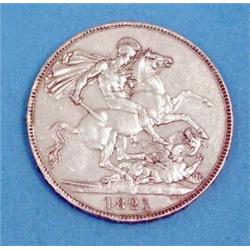 A George IV crown 1821 (NEF, small edge knocks and obverse scratch on cheek)...