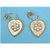 Image 1 : A pair of Victorian foliate engraved gold heart shaped earrings, set seed pearl clusters, the bac...