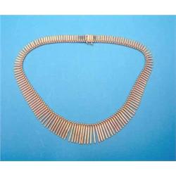 An 18ct gold fringe collar, designed as graduated baton links, 73.6grms...