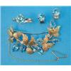 Image 1 : An 18ct gold leaf brooch, set 6 pear shape aquamarines and 3 round cut diamonds, together with a...