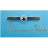 Image 1 : A 9ct gold bar brooch, mounted at the centre with a sapphire and diamond cluster...