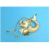 Image 1 : A gold brooch, in the form of a dolphin set diamonds, turquoises and a sapphire...