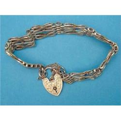 A 9ct gold 5-row gatelink bracelet, with padlock clasp, 14.5gms...