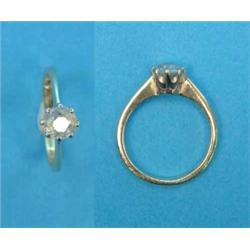 An 18ct gold solitaire diamond ring, claw-set with an old brilliant cut stone...
