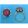 Image 1 : A gold cluster ring, set rubies and diamonds (lacks one diamond)...